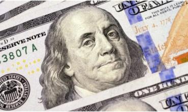 Bajan el dólar oficial y el riesgo país tras el anuncio de que la Argentina retorna al mercado de deuda