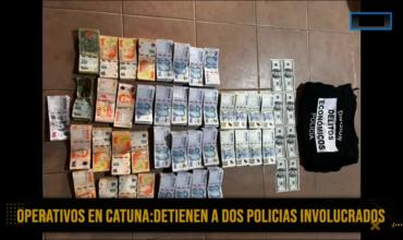 2 policías detenidos, 1.000 tarjetas de débito, 36 millones de pesos y un arma incautada en allanamientos a prestamistas